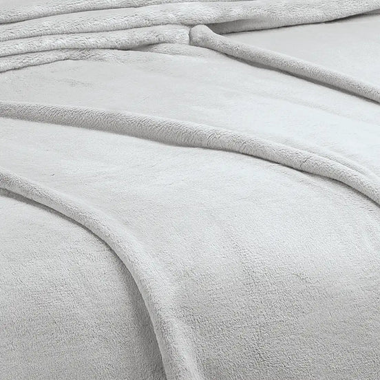 Imagen del producto Cobertor Milky Ostión de Regina, con diseño premium y detalles descriptivos